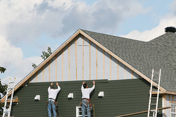 Professional Storm Damage Siding Repair technician working in Fort Lee, VA
